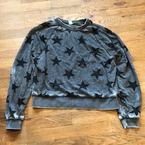 Grey crewneck sweatshirt with black stars